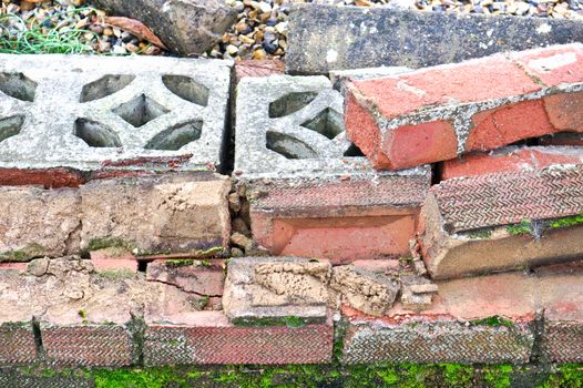 Pile of bricks and rubble from a collapsed wall