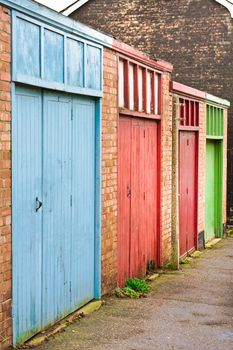 A row of colorful garage doors