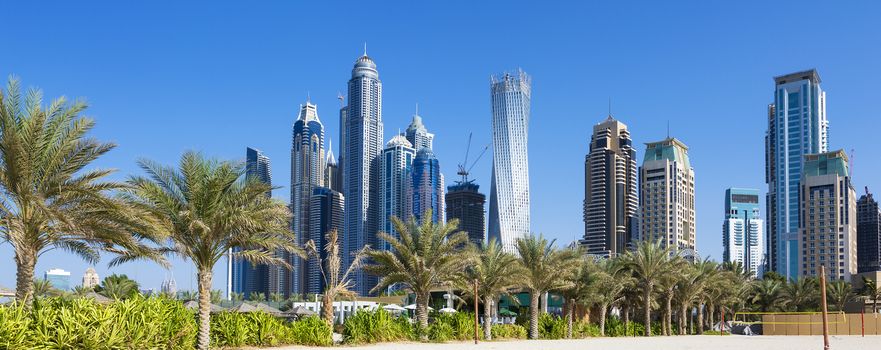 Panoramic view of skyscrapers and jumeirah beach in Dubai. UAE 