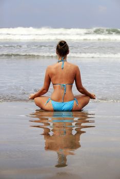 Meditation girl yoga on the beach