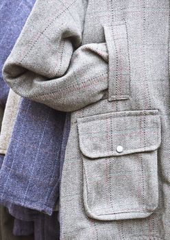Part of a tweed pattern jacket