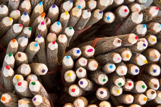 Tips of colorful pencils as a background image