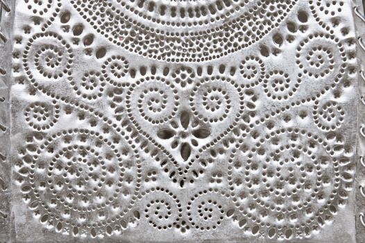 Engraved pattern in a metal surface