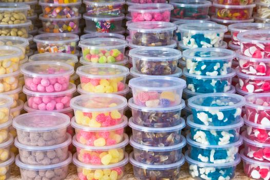 Tubs of sweets at a market stall