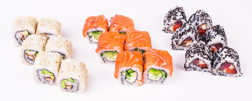 three sushi rolls isolated on white background 