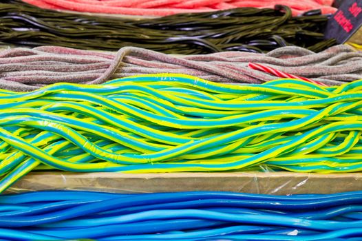 Colorful candy laces at a market stall