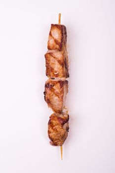 fried pork skewer isolated on white background