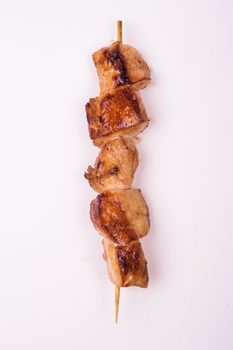 fried pork skewer isolated on white background