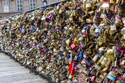 The bridge of arts has become the symbol of lovers who leave a padlock symbol of their bond