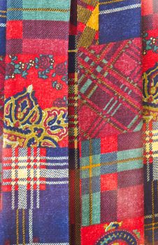 Colorful patchwork sheet with tartan patterns