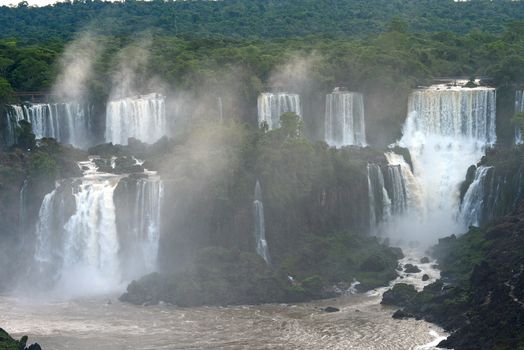 Iguassu waterfall in south america tropical jungle with a massive flow of water