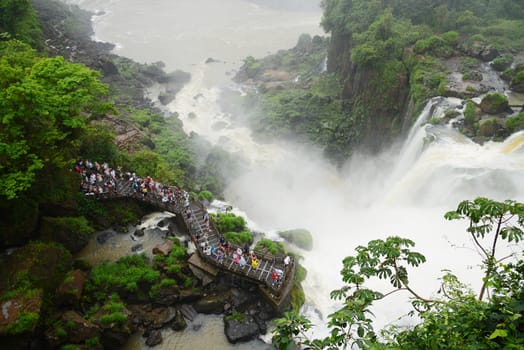 Iguassu waterfall in south america tropical jungle with a massive flow of water