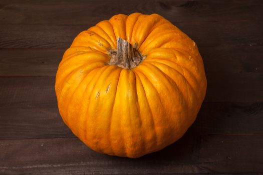 Autumn pumpkin on wooden table. Beautiful autumn Pumpkin thanksgiving background