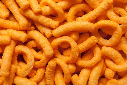 Closeup of cheese puffs. Fills the frame