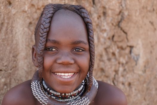 NAMIBIA, KAMANJAB, OCTOBER 10: Unidentified child Himba tribe. The Himba are indigenous peoples living in northern Namibia, in the Kunene region of South-West Africa on october 10 2014