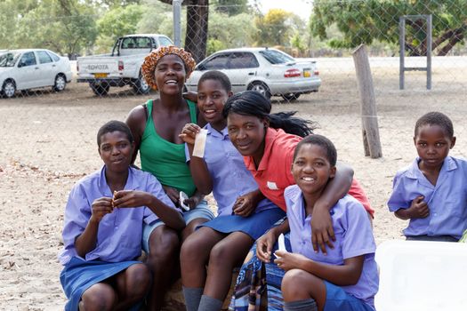 NAMIBIA, KAVANGO, OCTOBER 15: Happy Namibian school children waiting for a lesson. Kavango was the region with the highest poverty level in Namibia, more than 50% of the population were classified as poor. October 15, 2014, Namibia