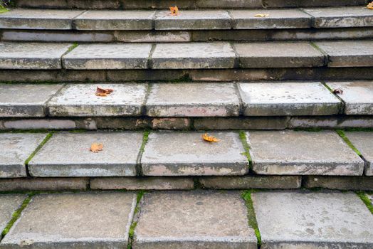 Photo of a stone staircase with autumn leaves. Taken in Sigulda, Latvia.