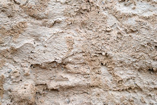 Photo of a messy cement wall. May be used for texture and background.