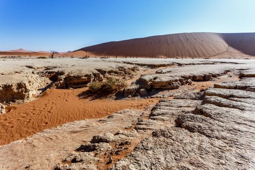 Sossusvlei beautiful sunrise landscape of hidden death valley in Namibian desert with blue sky, best place in Namibia