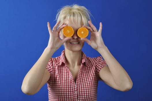 Portrait of womanwith a clementine