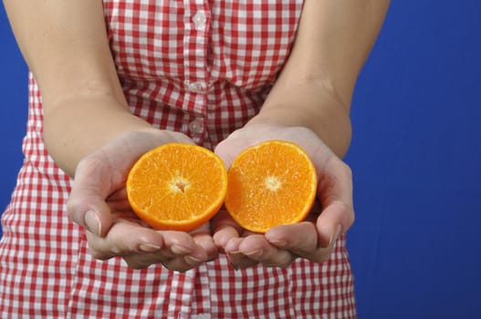 Portrait of womanwith a clementine