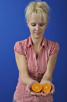 Portrait of womanwith a clementine