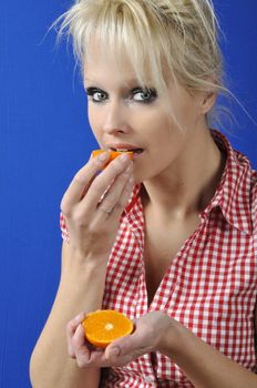 Portrait of womanwith a clementine