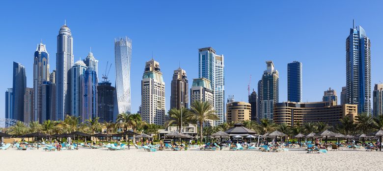 Panoramic view of famous skyscrapers and jumeirah beach in Dubai. UAE 