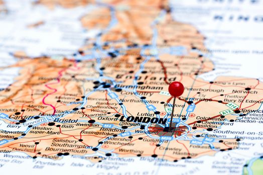 Photo of pinned London on a map of europe. May be used as illustration for traveling theme.