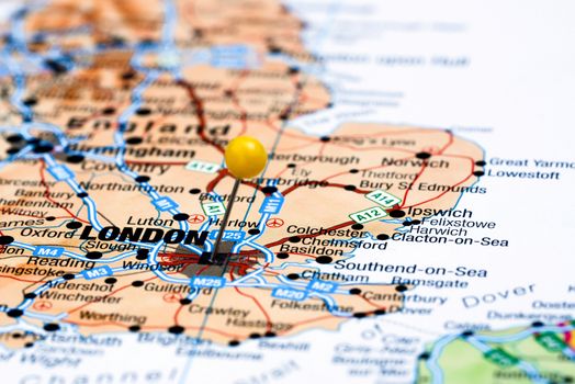 Photo of pinned London on a map of europe. May be used as illustration for traveling theme.