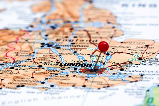 Photo of pinned London on a map of europe. May be used as illustration for traveling theme.