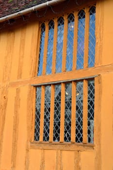 Window on orange half timbered house