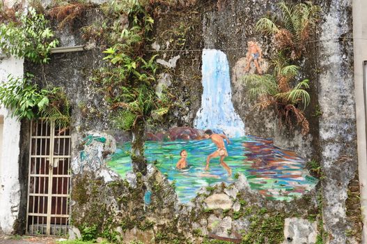 graffiti of waterfall and ponds on the ward at the back street in Ipoh Malaysia