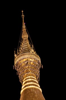 The top of Shwedagon pagoda in Yangon at night, Myanmar