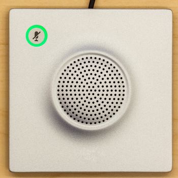 Microphone icon switch, and loudspeaker on wood background for conferencing room