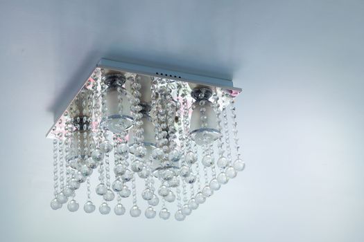 Crystal chandelier on ceiling