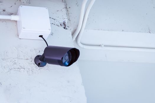 cctv camera security on wall background in room for safety concept