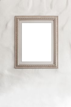 blank photo frame on white wall background