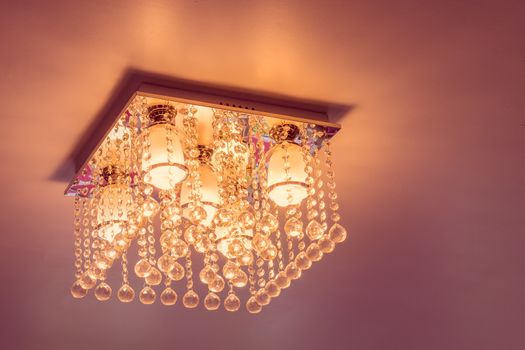 Crystal chandelier on ceiling