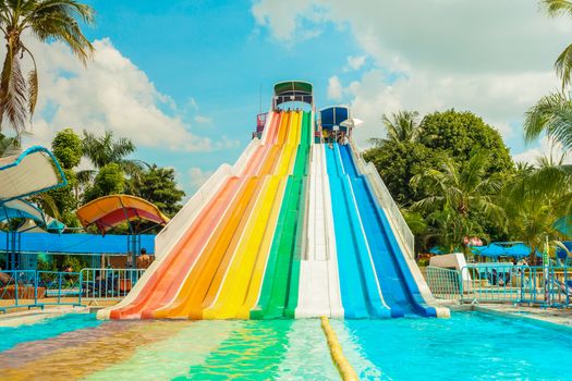 BANGKOK, THAILAND - NOVEMBER 9: Unidentified people play slide at Siam Park City water park in Bangkok, Thailand on November 9, 2014