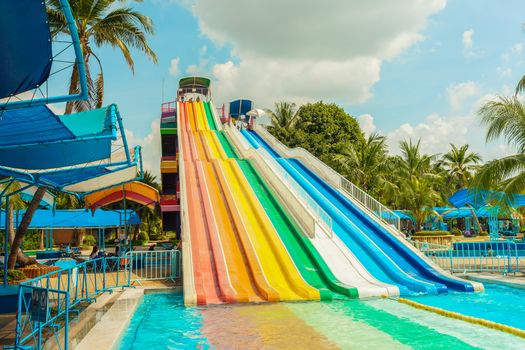 BANGKOK, THAILAND - NOVEMBER 9: Unidentified people play slide at Siam Park City water park in Bangkok, Thailand on November 9, 2014