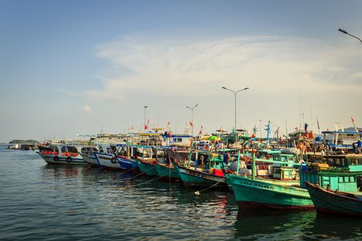Phu Quoc, Vietnam - November 2nd, 2013: At sunset, i have trip to An Thoi fishing port. I shot a picture about these fishisng boats is in queue. At An Thoi port, Phu Quoc, Vietnam