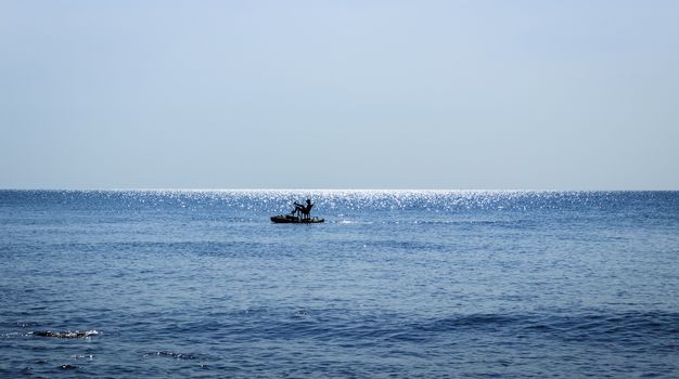 The men in pedal boat alone at the Long Beach, Phu Quoc, Viet Nam