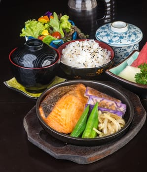 japanese cuisine. hot plate fish on background