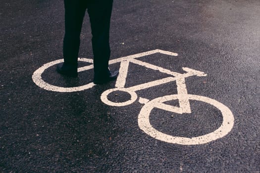 Bicycle sign on the road after the rain,Beijing