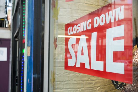 Closing down sale sign on shop window