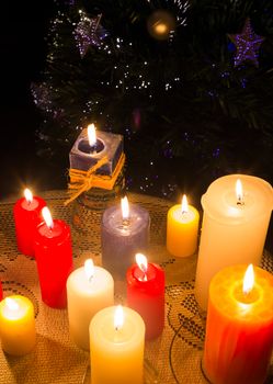 burning colorful candles,creating an atmosphere of celebration, Christmas