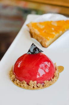 Raspberry yogurt mousse  , sweet red dessert on plate