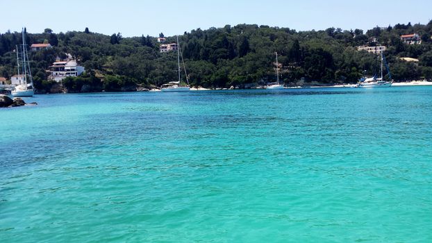The wonderful, crystal-clear waters of Lakka Bay on Paxos Island, Greece.

Picture taken on July 6, 2014.