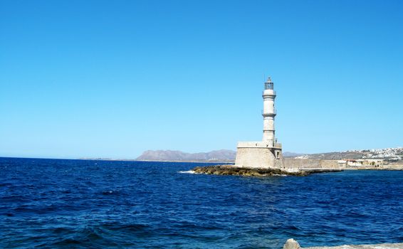 Side view of the lighthouse in Chania Old Port, in Crete Island, Greece.

Picture taken on July 27, 2010.